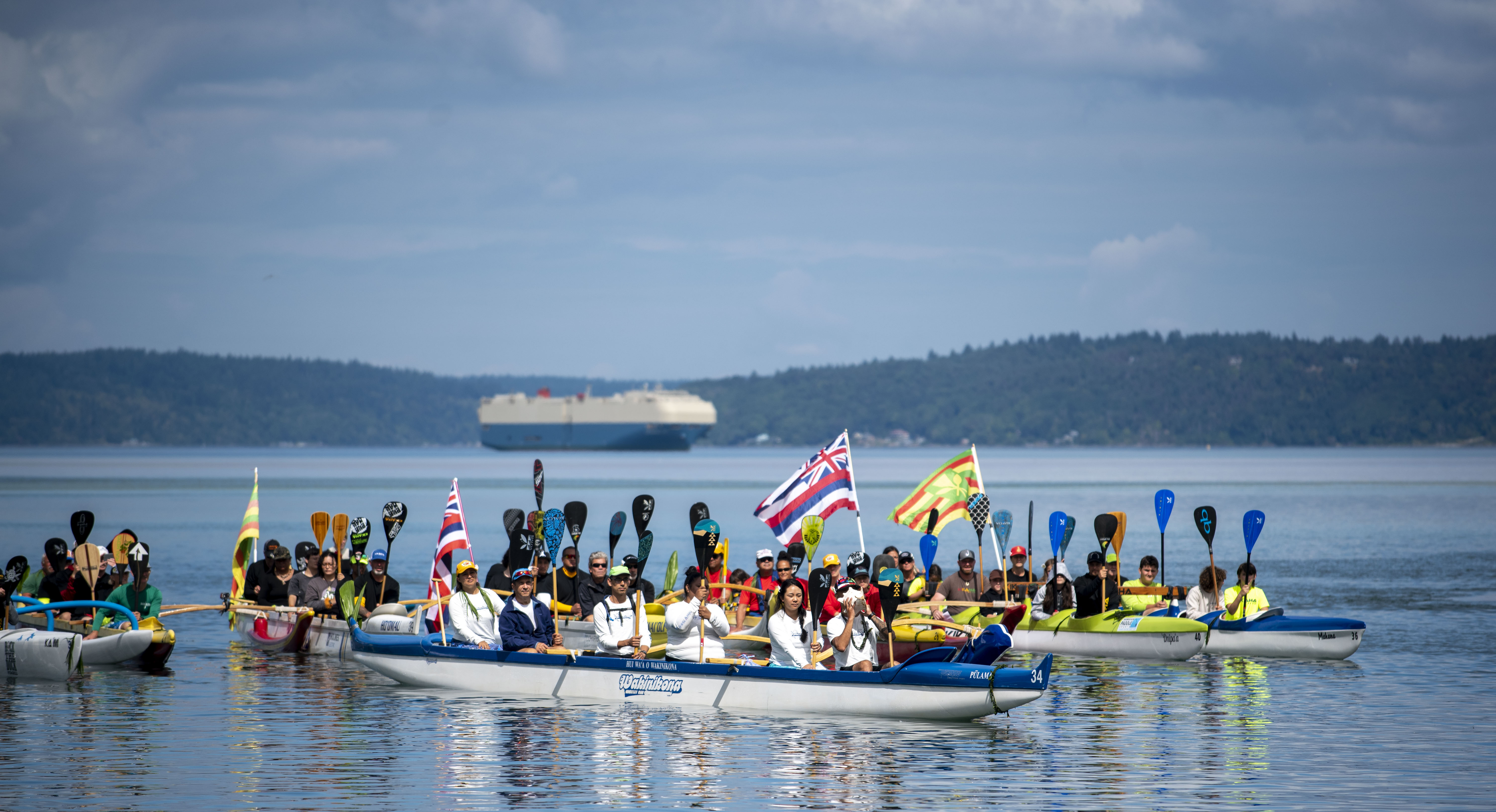 After traditional protocols, tribal members escorted Hōkūleʻa to the waters off Thea’s Park, where the outrigger canoe community offered a water welcome.